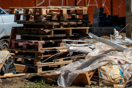 Rubbish, bags and wooden blocks left after renovation and construction.のeditorial素材