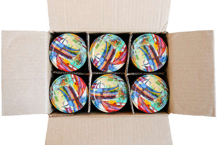 Magnitogorsk, Russia - 11.13.2020: Tins of canned food with a bright lid in a box.