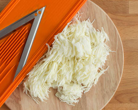White cabbage finely chopped with a special knife.の写真素材