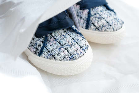 Sneakers for a child with a white sole in the package.の写真素材
