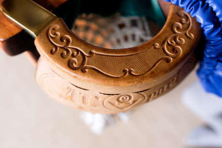 A billiard pocket. Patterned leather trim. No people, blurred background.の写真素材