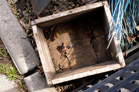 Old wooden empty box in the garden. Top view, no people.の写真素材