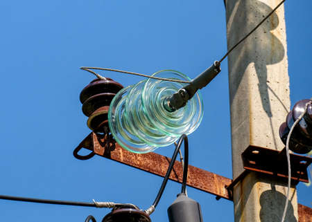 Installation of electrical networks on a concrete pillarの写真素材