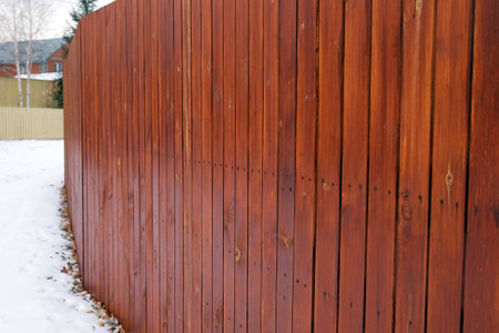 Wooden smooth fence in the villageの写真素材