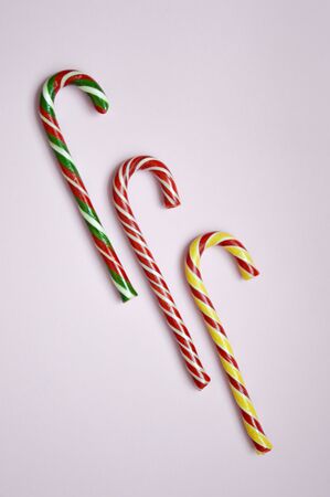 Christmas candy canes. Candy for Christmas and New year, candy sticks in stripes. Preparation for the holiday. Candyの写真素材