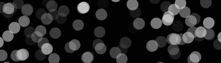 Bokeh on black background. Merry Christmas and happy New year. Background for a Christmas card. Winter holiday. Happy holiday. Decor for the New Year. Elements of the winter holiday.の写真素材