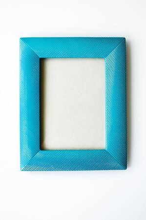 turquoise decorative photo frame on a white background.