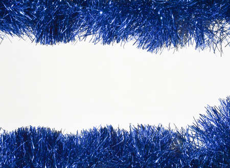 blue shiny tinsel on a white background. banner design, greeting cards for Christmas and new year.の写真素材