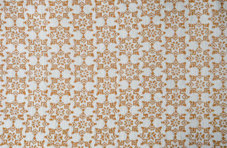 background for the design. the texture of the fabric with an ornament. cover, textile. a decorative...