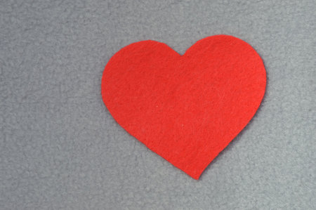 Happy Valentine's Day. background for the design of a romantic holiday. love. Red felt heart.の写真素材