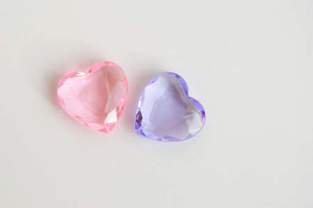 Happy Valentine's Day. background for the design of a romantic holiday. love. Two stone hearts, pink and purple.の写真素材