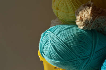 knitting day. colored motoki woolen thread needlework. background for the design.の写真素材