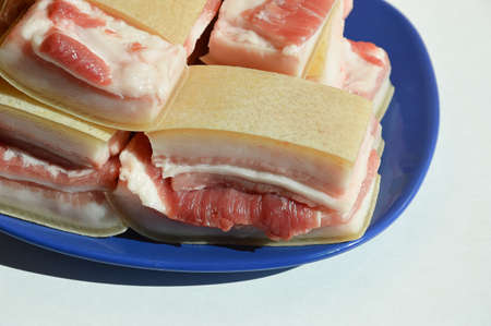 pork fat with streaks. bacon with skin. pig meat.の写真素材