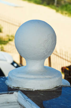 architectural element on the balcony, the capital is white. background for the design.の写真素材