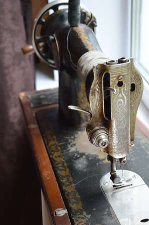 old sewing machine. antiques, an old item. background for the design.