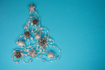 preparing for a Happy New Year and a Merry Christmas. winter holidays. background for the design. cute decorations for the fir tree.の写真素材