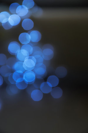 festive bokeh. background for the design. preparing for a Happy New Year and a Merry Christmas. glowing sequins.の写真素材