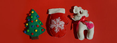 Christmas toys on a red background. Christmas and New Year concept.の写真素材
