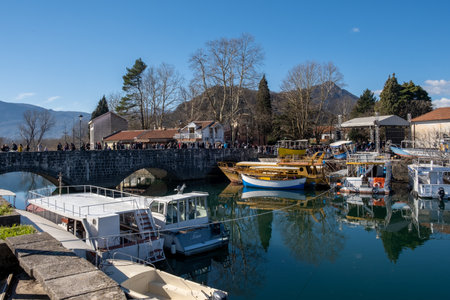 Boats on the calm water of the lake - about February 2023, Virpazar, Montenegroのeditorial素材