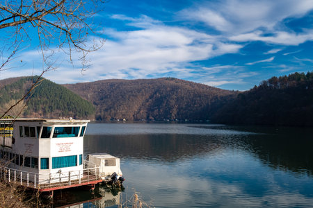 A boat on the water in the mountains - About December 2022, Serbiaのeditorial素材