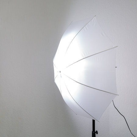 Impulse studio light with white umbrellaの写真素材