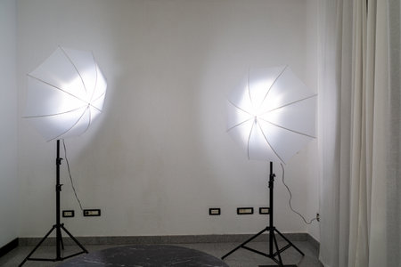 Impulse studio light with white umbrellasの写真素材