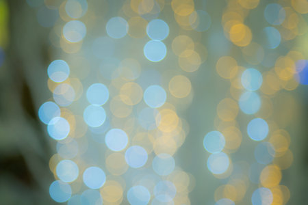 Colored bokeh, out of focus, holiday backgroundの写真素材