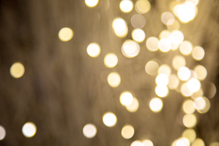Colored bokeh, out of focus, golden lightの写真素材