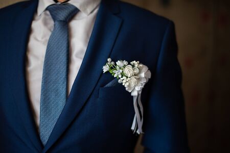 Handsome strict blue grooms robe and blue tie. White shirt.の写真素材