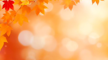 Defocused autumn background with bokeh and blurry red yellow and orange autumn leaves. abstract...