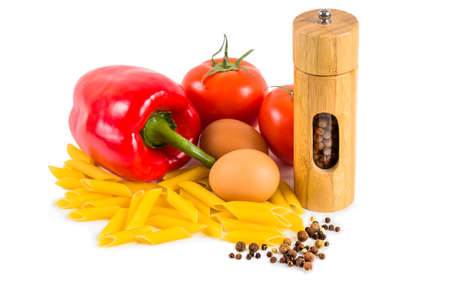 Pasta, tomatoes and spices on a white backgroundの写真素材