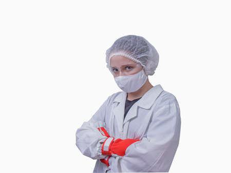 girl in a dressing gown and mask of self-isolationの写真素材