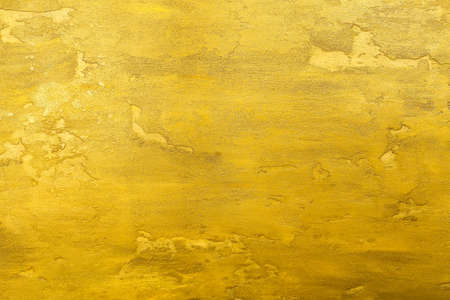 Rough cement wall texture background. abstract gold yellow background