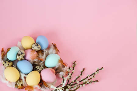 Top view of colored Easter eggs with a copy of the space
