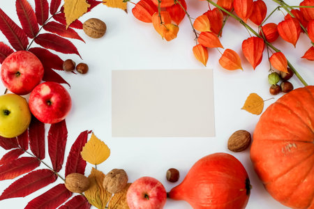 thanksgiving day concept, autumn harvest frame with space for text, leaves, apples and pumpkins, top...