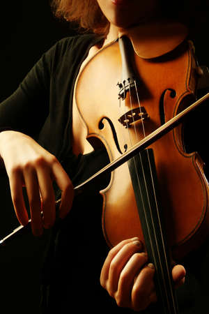 Violin musical instruments violinist hands. Classical musician orchestra music playingの写真素材