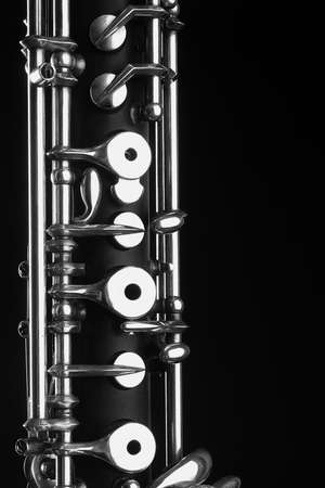 Oboe - musical instruments of symphony orchestra  Oboe mechanism detail closeup on black