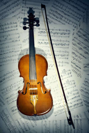 Violin notes  Musical instruments with music sheetの写真素材