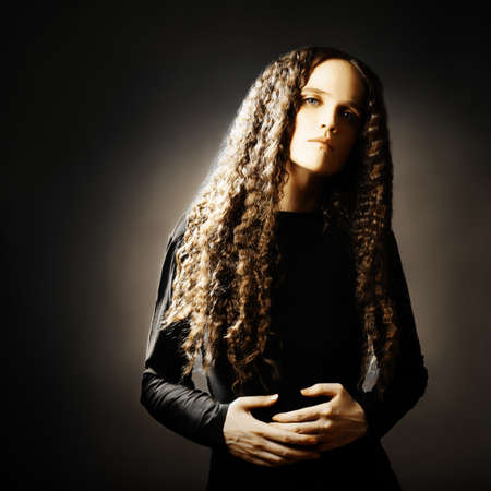 Young curly model portrait  Beautiful fashion woman