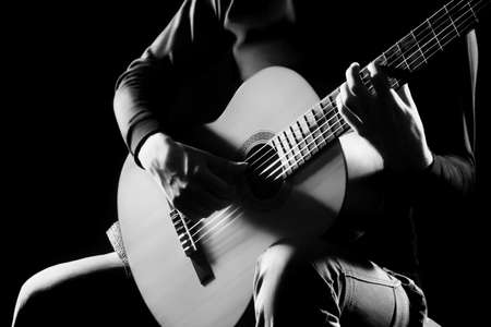Acoustic guitar player  Classical Guitarist hands with musical instrumentsの写真素材