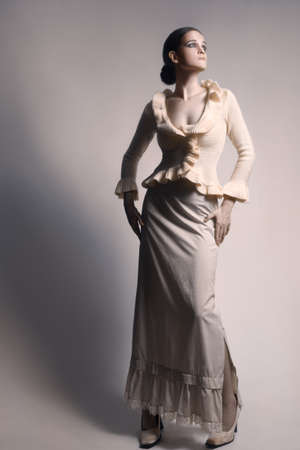 Elegant woman in long skirt white dress.  Fashion model in romantic clothesの写真素材