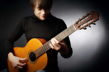 Acoustic guitar player guitarist man classical guitar playingの写真素材