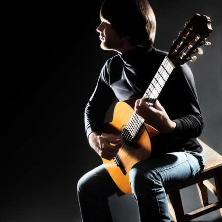 Acoustic guitar player guitarist man classical guitar playingの写真素材