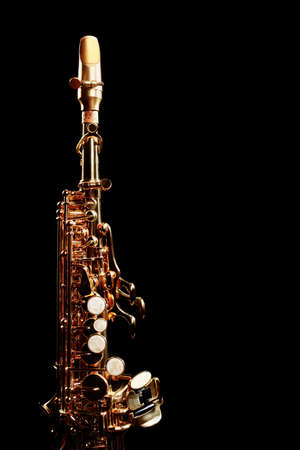 Saxophone soprano jazz music instruments isolated on black Sax close upの写真素材