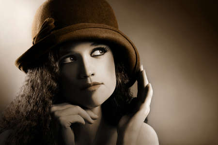 Retro woman vintage portrait in hatの写真素材