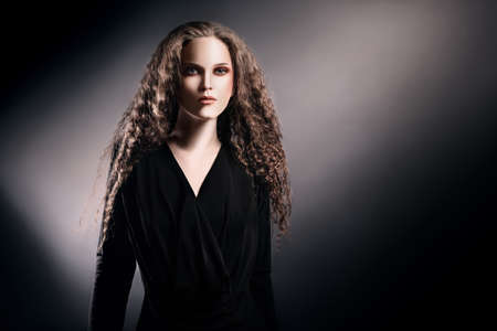 Elegant curly woman portraitの写真素材