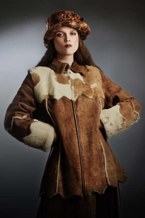 Sheepskin coat winter clothes Elegant woman fashion winter hatの写真素材
