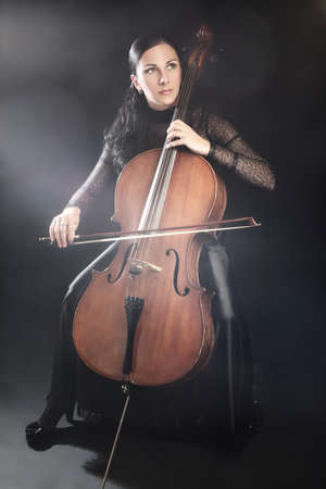 Cello player cellist playing violoncello Classical musiciansの写真素材