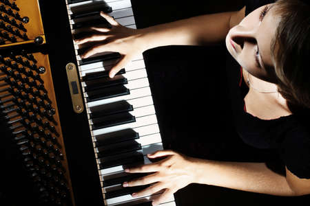 Piano player pianist playing musical instrumentの写真素材