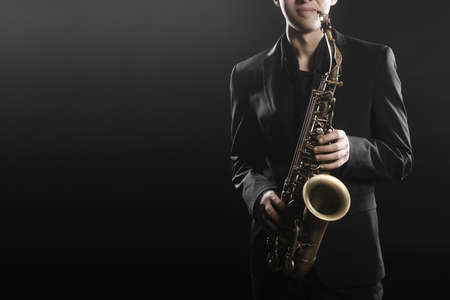 Saxophone payer Saxophonist jazz man playing sax alto